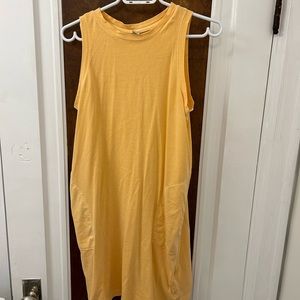 Orange beach dress with pockets.